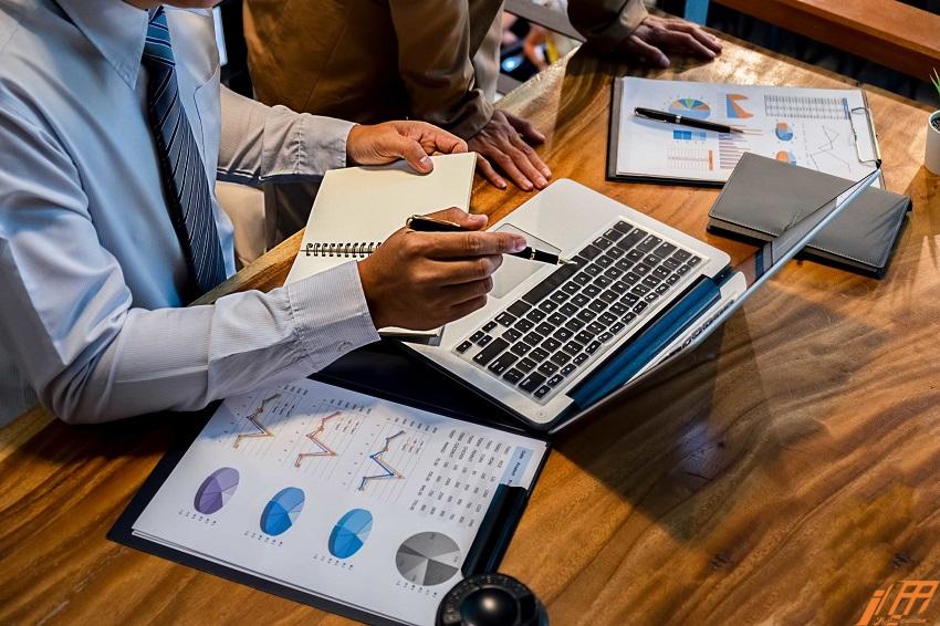 Administrator business man financial inspector and secretary making report calculating balance. Internal Revenue Service checking document. Audit concept حسابداری